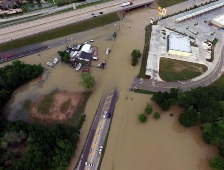 Flood waters cover the area of FM 1463 at IH-10 in Fort Bend County, Texas, U.S. April 19, 2016.  Texas DOT-Houston/Handout via Reuters