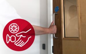 How can holding open doors prevent the spread of COVID-19
